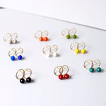 Load image into Gallery viewer, Orbit round earrings
