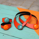 Load image into Gallery viewer, Orange Leather Necklace + Ceramic Button
