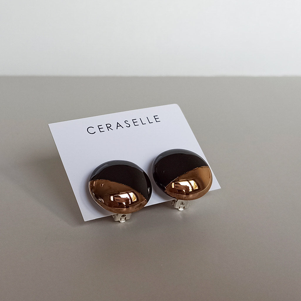 Black & gold clip on ceramic earrings