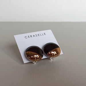 Black & gold clip on ceramic earrings